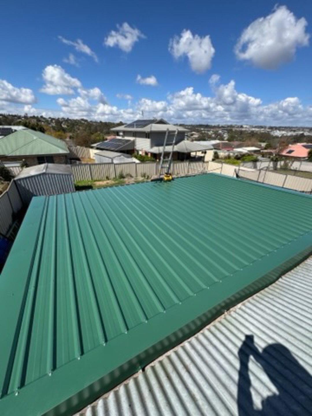 New green Colorbond roof on a suburban home